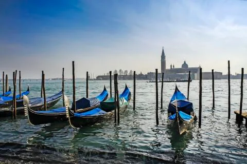 Gondolas moored in front of Saint Mark square Stock Photos