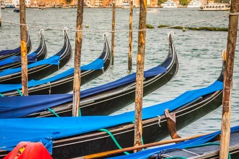Gondolas moored by saint mark square. venice, italy, europe Stock Photos