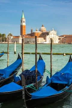 Gondolas moored by saint mark square. venice, italy, europe Stock Photos