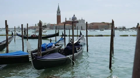 Gondolas from Piazza San Marco with San Giorgio Maggiore in the background Stock Footage 68776783