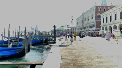 Gondolas rising and falling on tide Venice harbour time-lapse Stock Footage 56568804