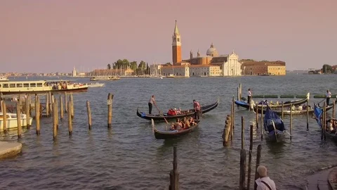 Gondolas at Saint Mark's Square looking towards San Giorgia Maggiore, Venice  Stock Footage 83345965