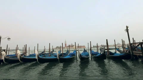 Gondolas sway on the waves in Venice Stock-Footage 47696066