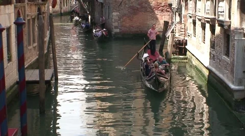 Gondolas on a Venice Canal Stock Footage 1038806