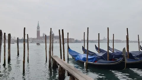 Gondolas in Venice lagoon 4K time lapse - Venice, Italy Stock Footage 84178311
