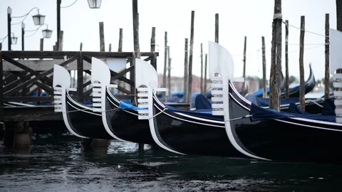 Gondolas in Venice Swaying on the Waves. Cloudy Weather. Close up View. Italy. Video stock 111903605