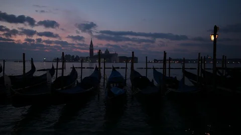 Gondolas on the wave at Piazza San Marco. Venice. Italy Stock Footage 87652873
