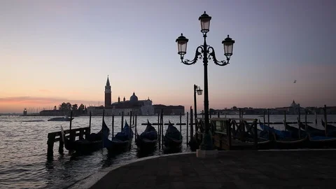 Gondolas on the wave at Piazza San Marco. Venice. Italy Stock Footage 87655616