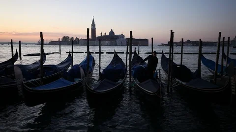 Gondolas on the wave at Piazza San Marco. Venice. Italy Video stock 87658022