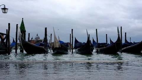 Gondolas on the wave at Piazza San Marco. Venice. Italy Video stock 88103481