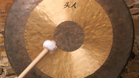 Gong. Hitting a gong.Zoom in. Stock Footage