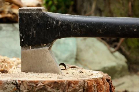 Good axe which is deeply thrust in a stub Stock Photos