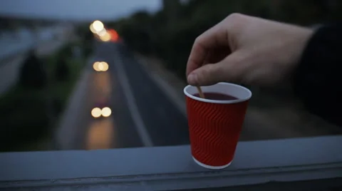 Good evening with a cup of tea at night lights background Stock Footage