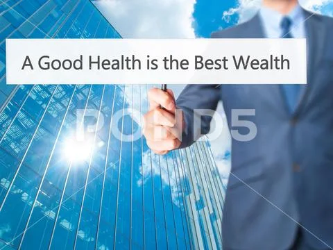 A Good Health is the Best Wealth - Business man showing sign Stock Photos