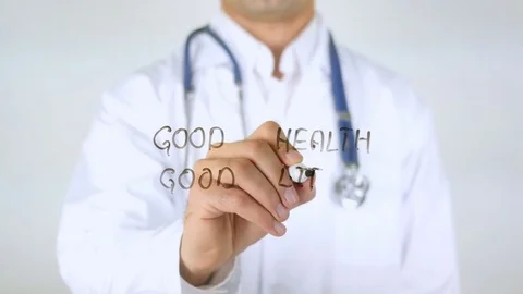 Good Health, Good Life, Doctor Writing on Glass Stock Footage