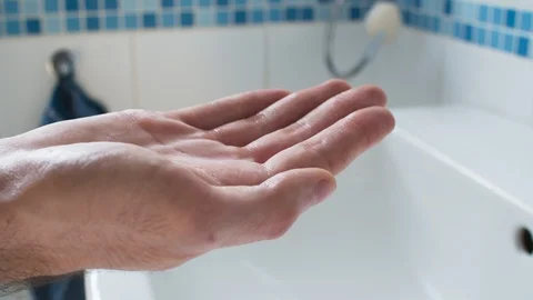 Good Hygiene: Man using soap to wash his hands 스톡 동영상 126657876