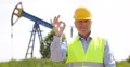 Good Job Best Result Gesture Confident Technician Pump Platform Oil Industry 4k or 4k+ Resolution