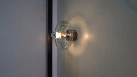 Good Light: Sleek Round Wall Lamps in Style Video stock 310036669