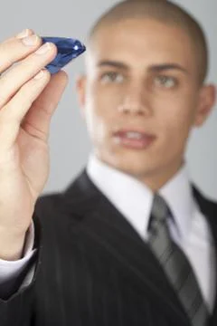 Good Looking Businessman on Gray Stock Photos