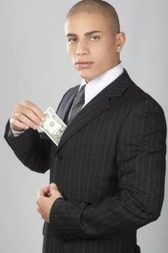 Good Looking Businessman on Gray Stock Photos