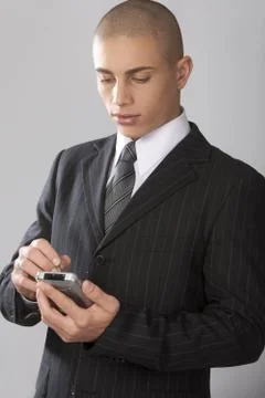 Good Looking Businessman on Gray Stock Photos