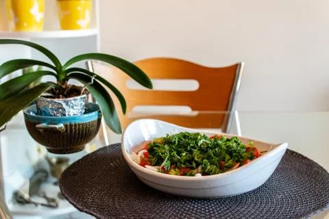 A good looking closeup side view shoot of seasonal salad and flower pot Stock Photos