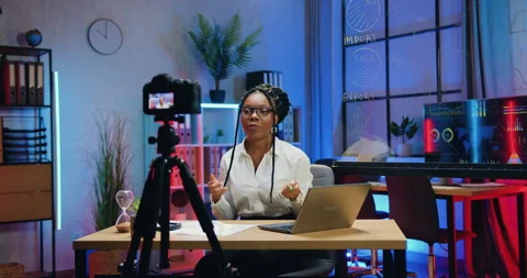 Good-looking confident experienced african stylish businesswoman holding online Stock Footage 166633830