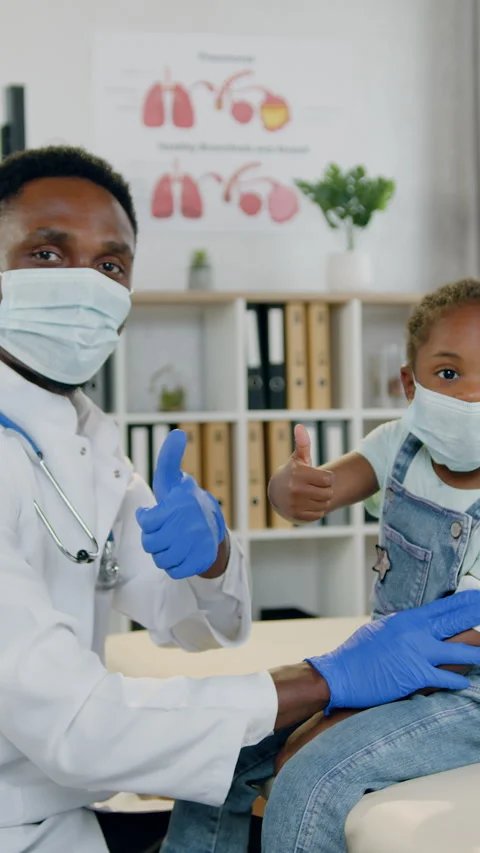 Good-looking friendly skillful african american man-pediatrician and lovely 6-ag Stock Footage 328359353