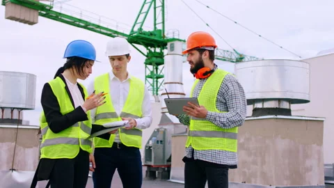 Good looking group of young specialists engineer and architect analyzing some Stock Footage 143153882