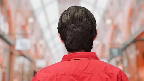 Good looking guy in a mall, 4k ProRes Video stock 164328861