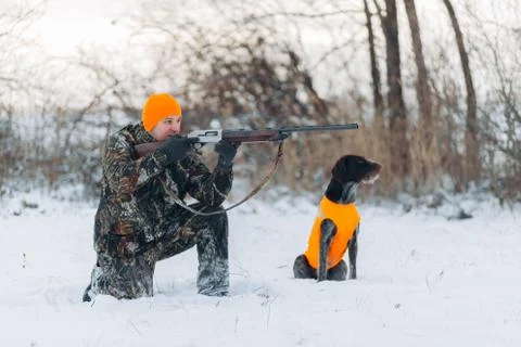 Good looking guy pulling the trigger Stock Photos