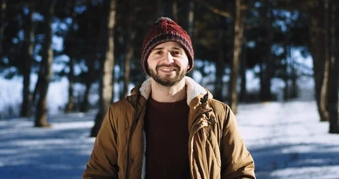 Good looking guy smiling very lovely in front of the camera he wearing a hat in Video stock 112617513