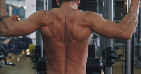 Good looking guy working hard on gym class working on his triceps muscles Stock Footage 115936815