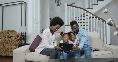 Good-looking happy satisfied loving african american parents with small Stock Footage 144260800