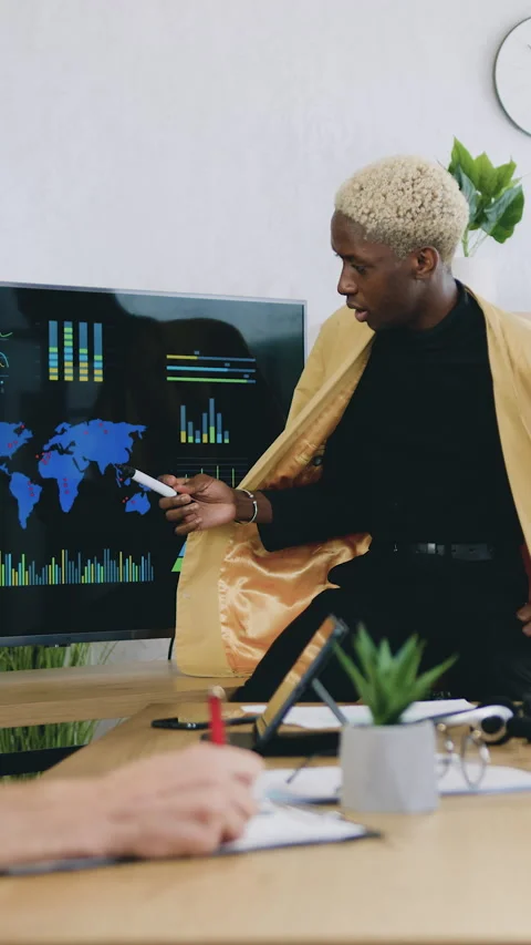 Good-looking high-skilled successful creative young multicultural men sitting ar Stock Footage 325387828