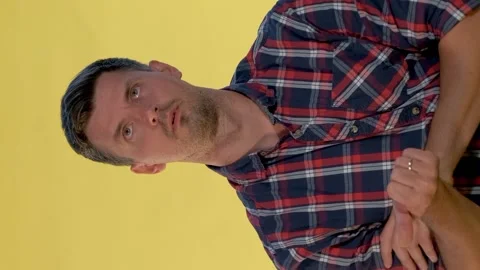 Good-looking man counting something on finger Stock Footage 130205368