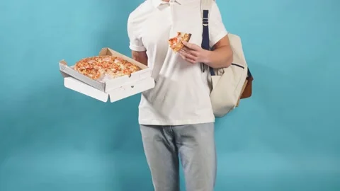 Good-looking man with pizza Stock Footage 124004221