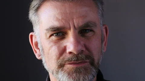 Good looking middle aged man smiles to camera Stock Footage 61757067