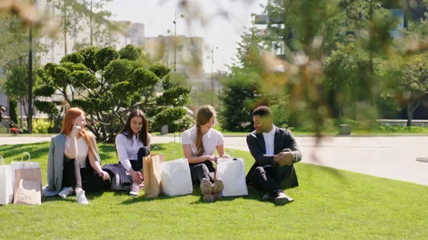 Good looking office workers very happy and excited at lunch time take their Stock Footage 164859765