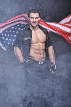 Good looking policeman posing Stock Photos