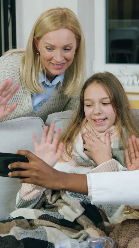 Good-looking satisfied in high spirits 15-aged girl and her caring loving mother Stock Footage 331475405