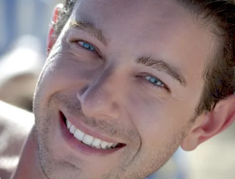Good looking smiling guy Stock Photos