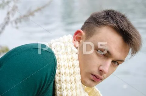 Good looking young man outdoors in nature (river, lake) Stock Photos