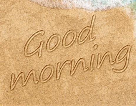 Good morning, message text concept card, text written on sand beach Stock Photos