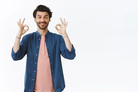 Good, nice choice. Supportive friendly and happy handsome bearded man rate Stock-Fotos