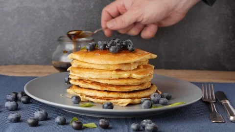 Good old fashioned fluffy pancake stack with blueberry topping Stock Footage 86189953
