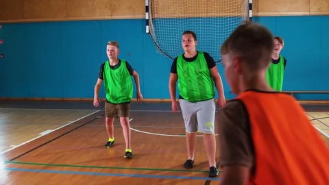 Good passing when orange team is playing Stock Footage 78537166