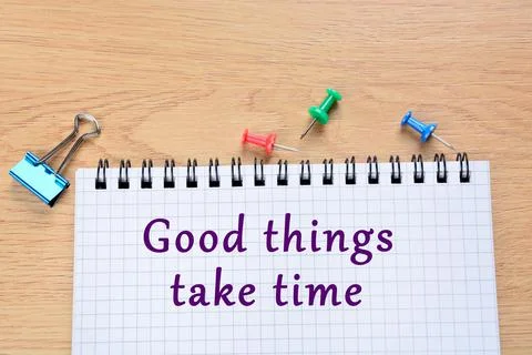 Good things take time text on notebook page 스톡 사진
