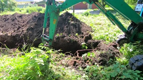 Good work of a mini excavator 스톡 동영상 135439777