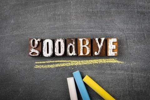 Goodbye. Communication concept. Colored pieces of chalk on a blackboard Stock Photos